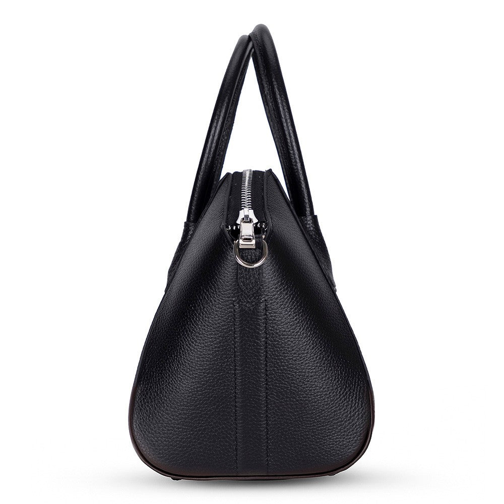 Side profile of Alessia women's black leather bag with zipper detail