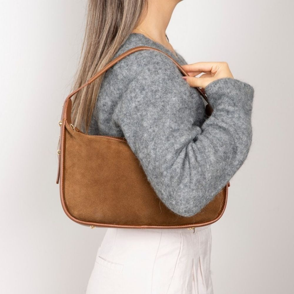 Bellara women's tan leather handbag worn over the shoulder