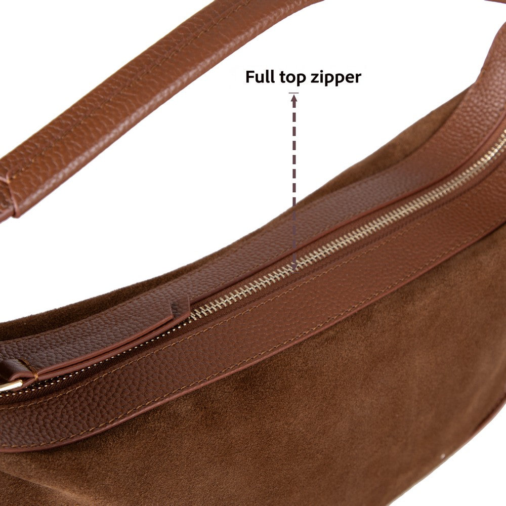 Side profile of Bellara women's tan leather bag with zipper detail