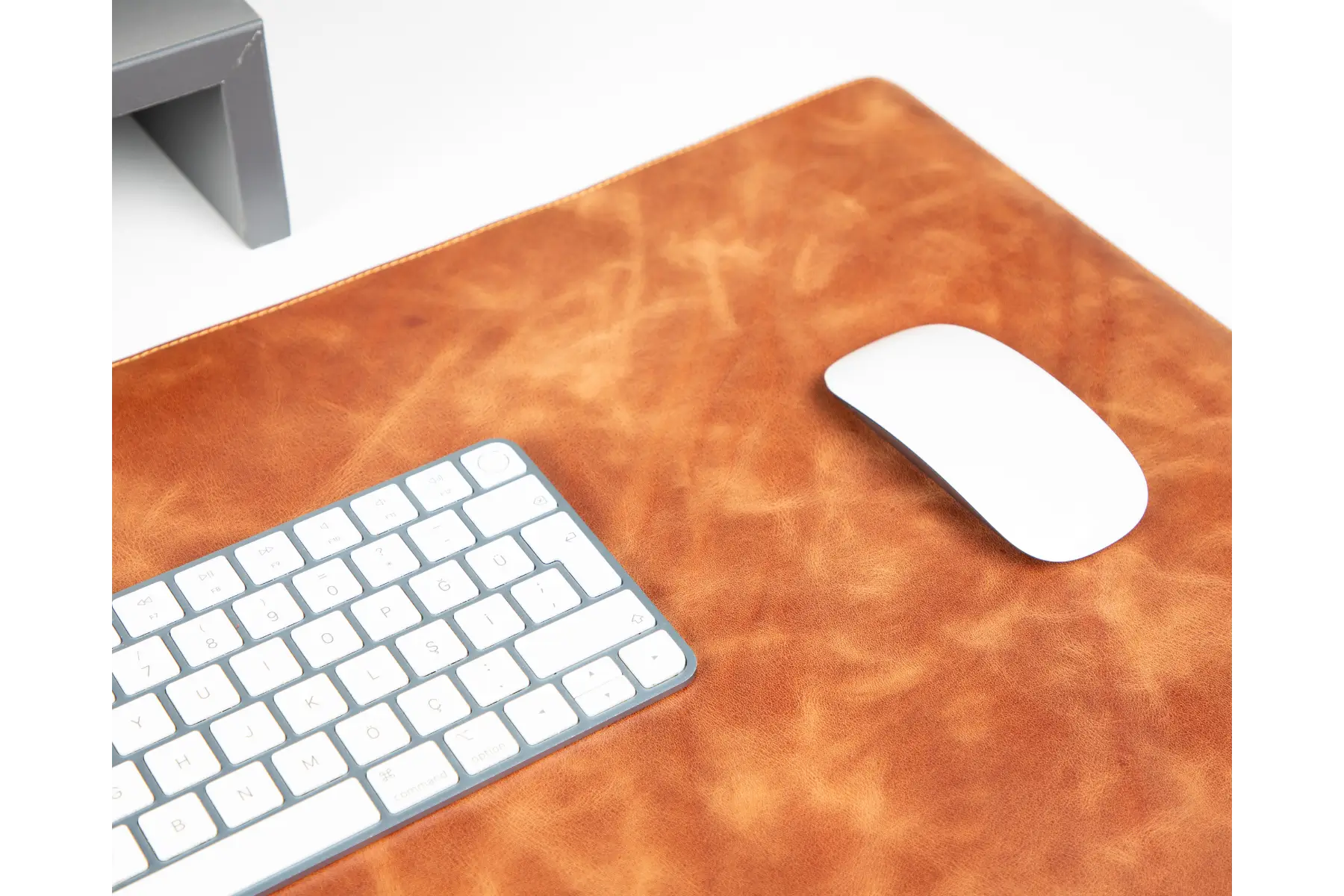 Camel brown leather desk mat detail close-up