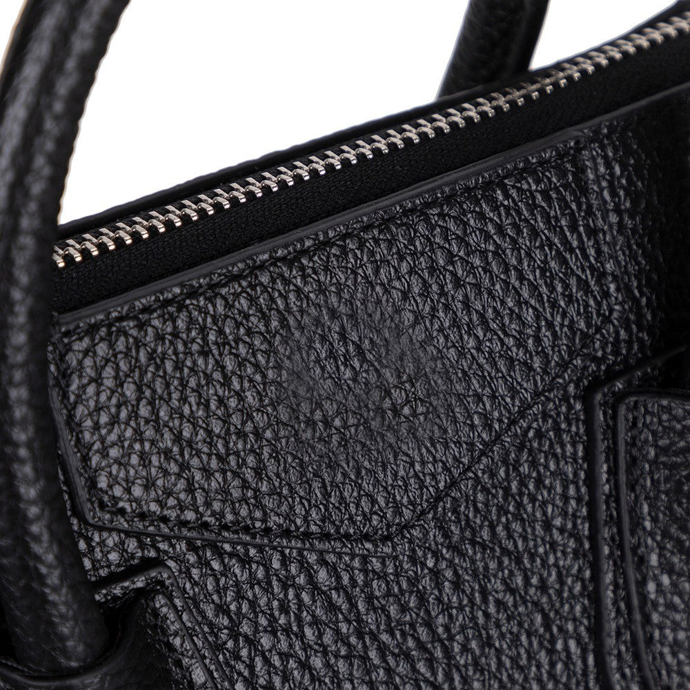 Close-up of Alessia women's black leather bag texture and stitching