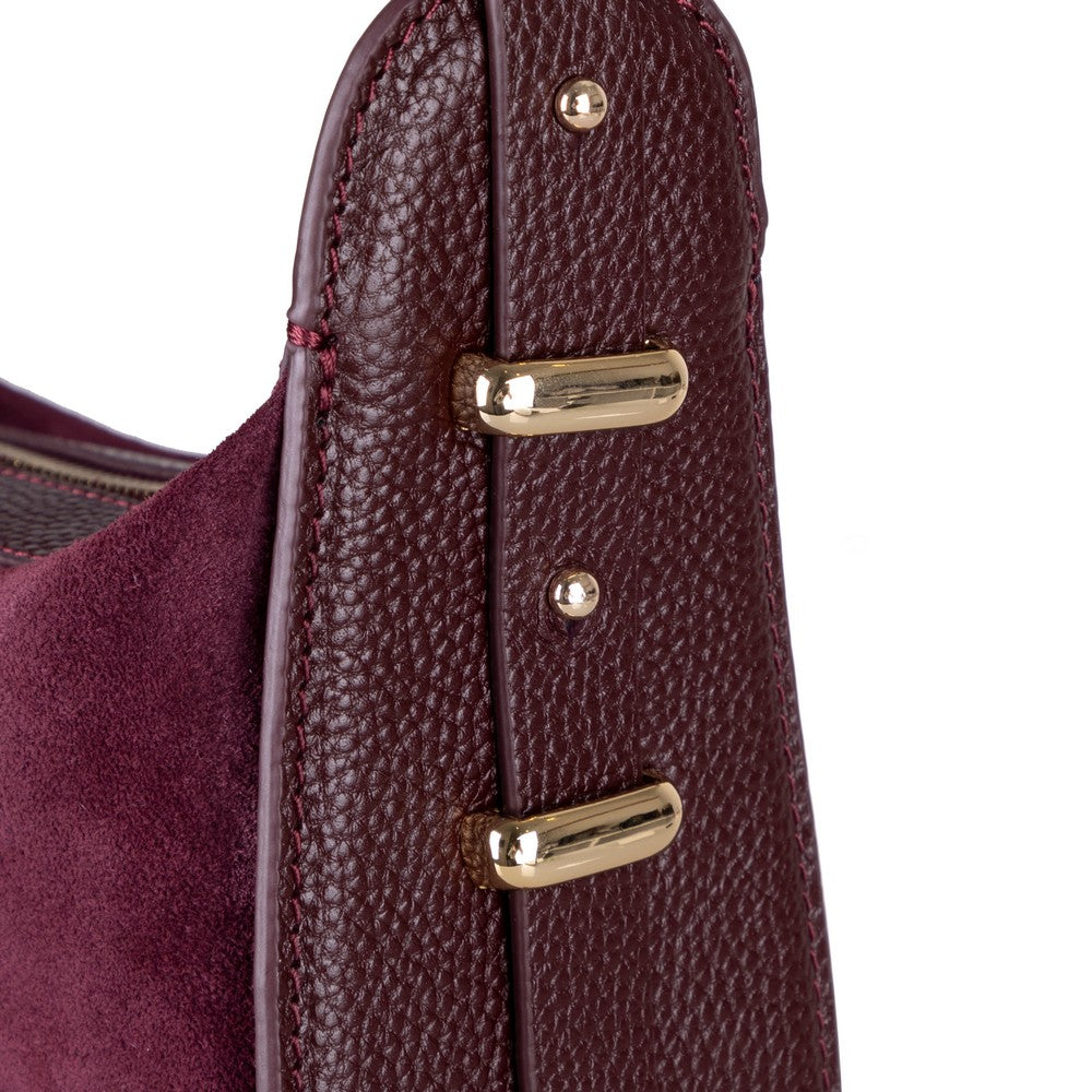 Close-up of Bellara women's Burgundy leather bag texture and stitching