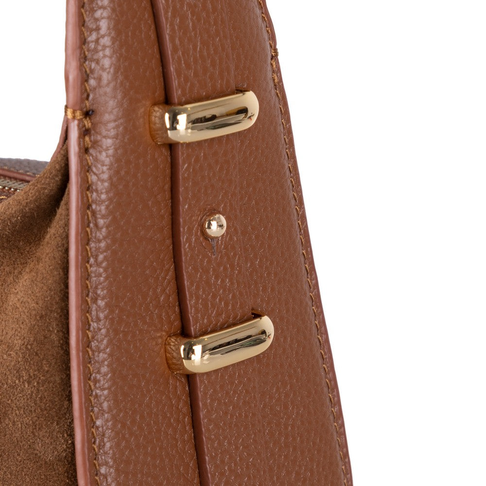 Close-up of Bellara women's tan leather bag texture and stitching