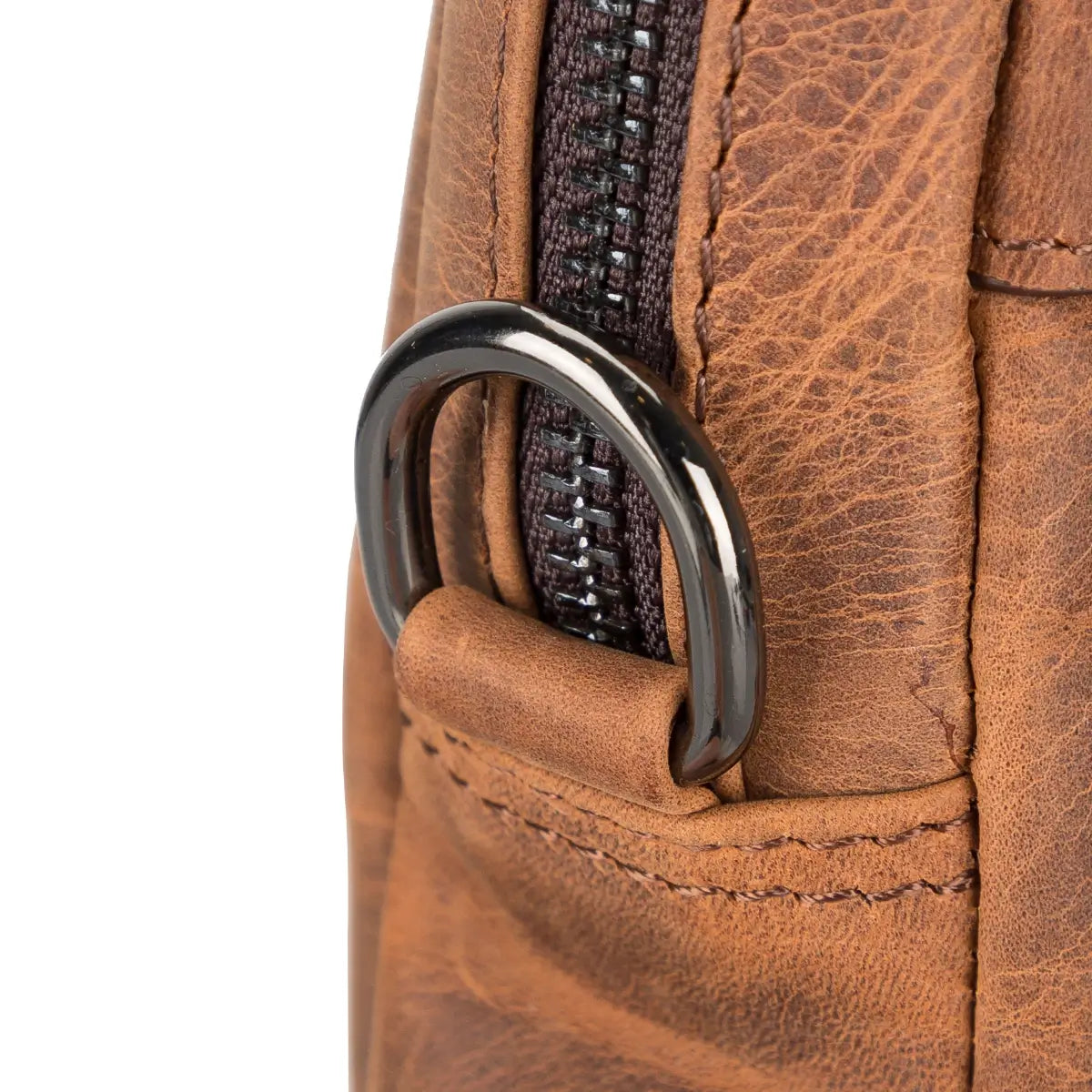 Close-up of a brown leather bag with a metal clasp 